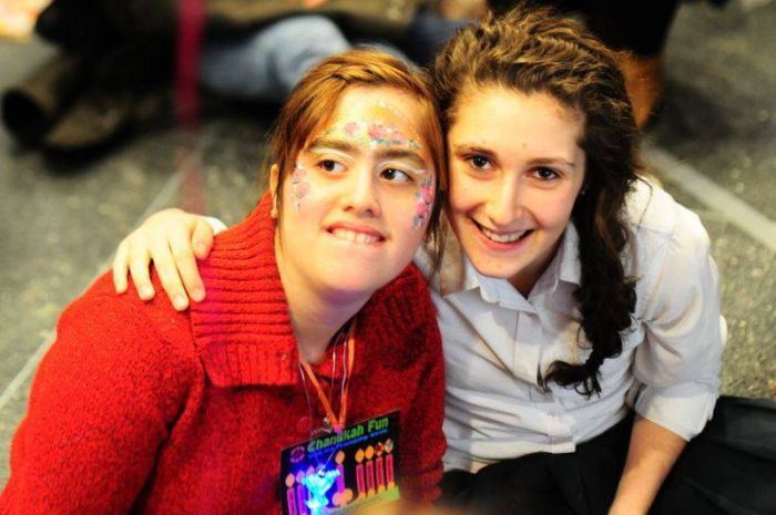 LED Menorah necklace at a Chanukah party